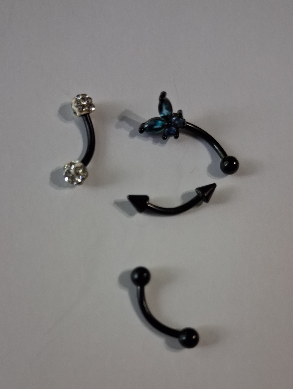Black Curved Barbell Body Jewelry Set with Clear and Blue Accents